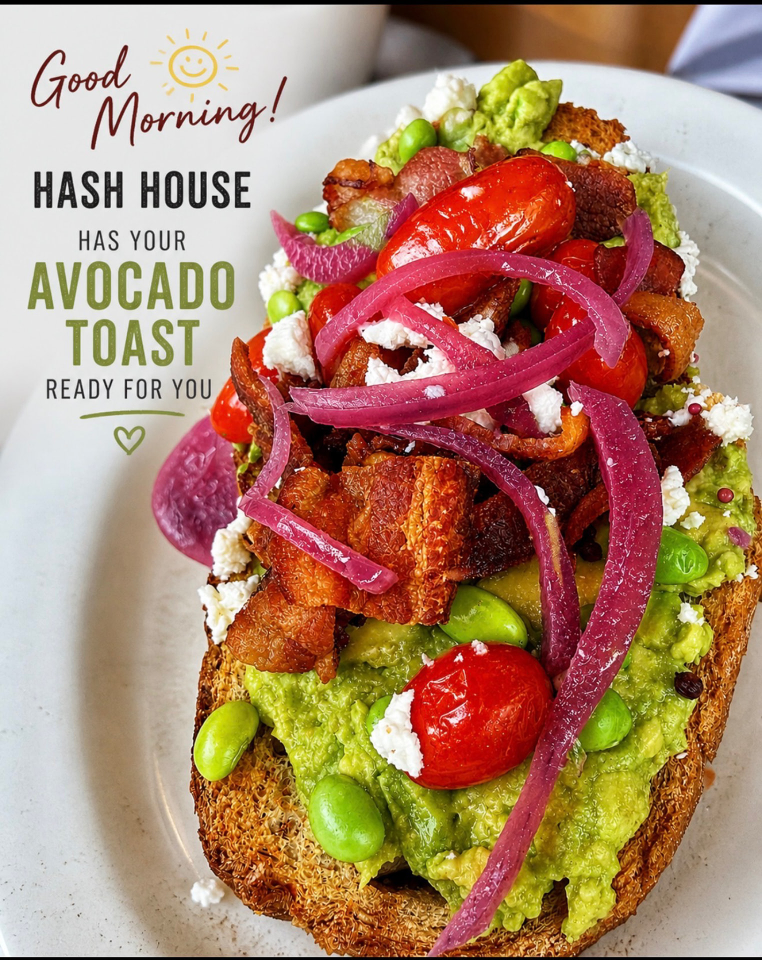 Avocado toast with bacon, blistered tomatoes, pickled onions and feta at Hash House